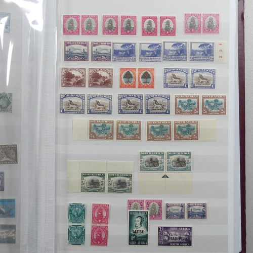  Stamps; A mainly unmounted mint selection of KGV to early QEII Stamps, in a stockbook with sets incl... 