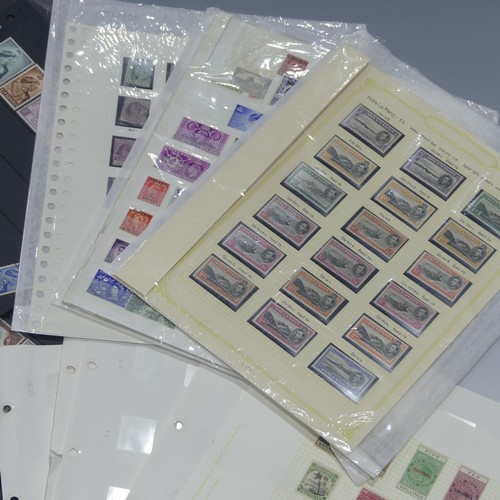  Stamps; A mint and used accumulation of British Empire Stamps, on leaves and stockpages including As... 