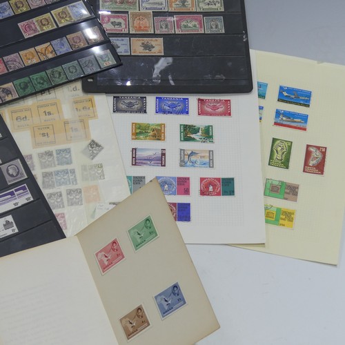  Stamps; A mint and used accumulation of British Empire Stamps, on leaves and stockpages including As... 