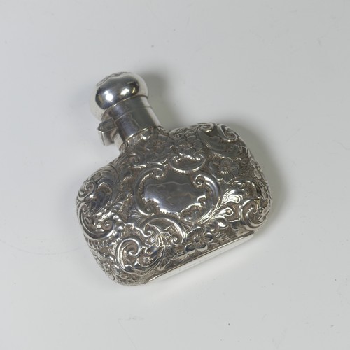 46 - A Victorian silver Scent Bottle / Flask, hallmarked Birmingham 1889, makers mark 'L.G', of shaped re... 