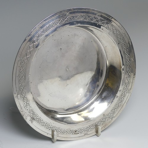 37 - Liberty & Co.; A George V silver Bowl, hallmarked Birmingham 1914, the shallow circular centre w... 