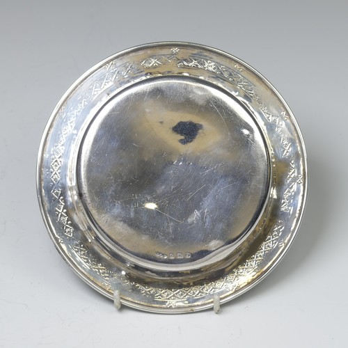 37 - Liberty & Co.; A George V silver Bowl, hallmarked Birmingham 1914, the shallow circular centre w... 