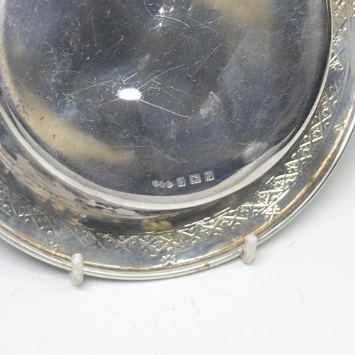 37 - Liberty & Co.; A George V silver Bowl, hallmarked Birmingham 1914, the shallow circular centre w... 