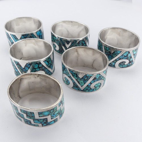 64 - A set of six Mexican silver Napkin Rings, inset with turquoise, marked 'TZ-09 925 Mexico', approx. t... 