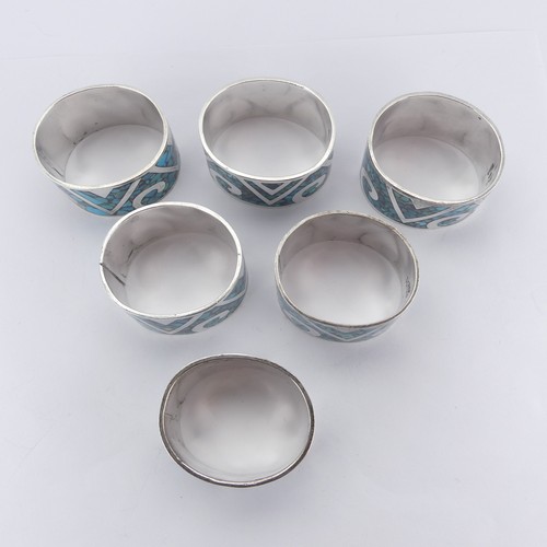 64 - A set of six Mexican silver Napkin Rings, inset with turquoise, marked 'TZ-09 925 Mexico', approx. t... 