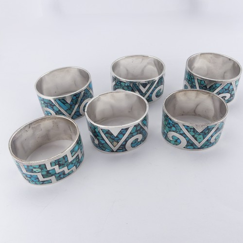 64 - A set of six Mexican silver Napkin Rings, inset with turquoise, marked 'TZ-09 925 Mexico', approx. t... 