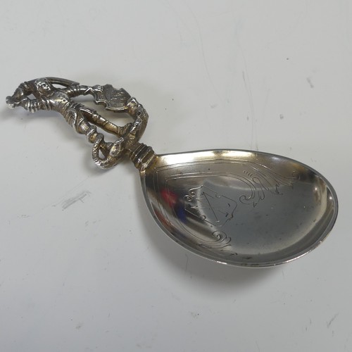 62 - A Norwegian silver (830 grade) Caddy / Anointing Spoon, with figural handle, marked 'MH 830s' f... 