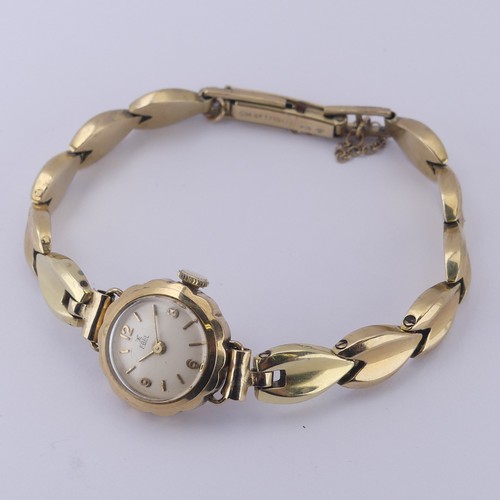 139 - A 9ct yellow gold lady's Ebel Wristwatch, manual wind movement, on 9ct gold bracelet strap, gross to... 