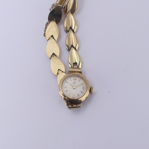 139 - A 9ct yellow gold lady's Ebel Wristwatch, manual wind movement, on 9ct gold bracelet strap, gross to... 