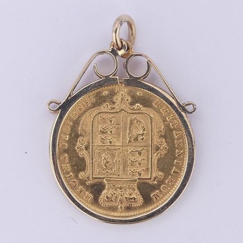 412 - A Victorian gold Half Sovereign, dated 1873, with shield reverse, in a 9ct gold pendant mount, appro... 