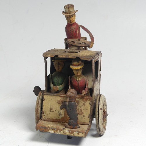 3 - A Lehmann tinplate clockwork Carriage, No. 520, the mechanism giving movement to the two seated figu... 