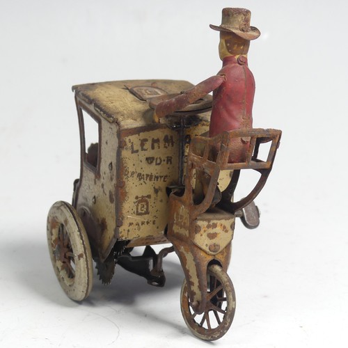 3 - A Lehmann tinplate clockwork Carriage, No. 520, the mechanism giving movement to the two seated figu... 