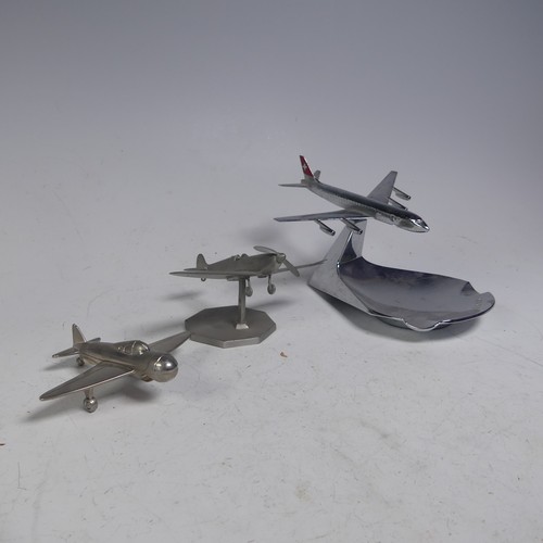 20 - A Swiss Air chromed cast metal desktop display Ashtray, the aircraft mounted on a pivotal stand, mad... 