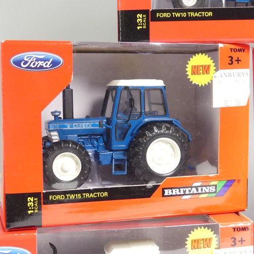 30 - A Britains 1:32 Ford TW25 model Tractor, together with four other Britains 1:32 Ford model Tractors,... 