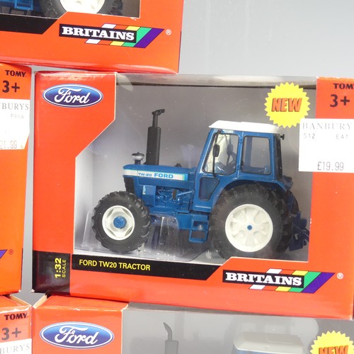 30 - A Britains 1:32 Ford TW25 model Tractor, together with four other Britains 1:32 Ford model Tractors,... 