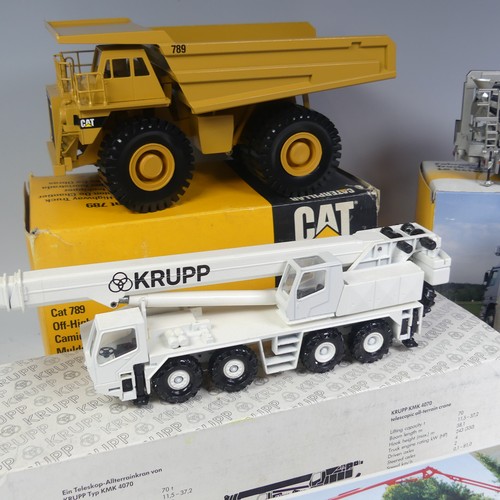 35 - A boxed Conrad 1:50 scale Caterpillar 789 Off Highway Truck, together with a 1:50 NZG No.652 HTM 804... 