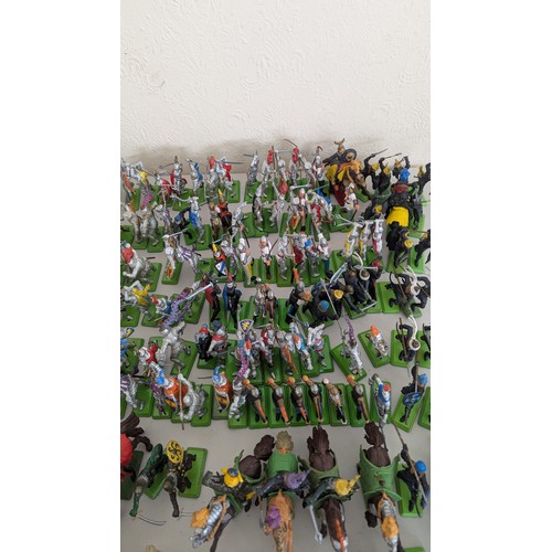 43 - Britains Deetail; A very large collection of unboxed playworn Knights, Turkish, Cowboys and Indian F... 