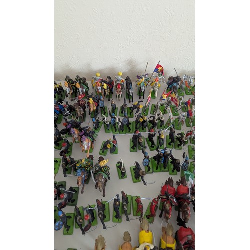 43 - Britains Deetail; A very large collection of unboxed playworn Knights, Turkish, Cowboys and Indian F... 