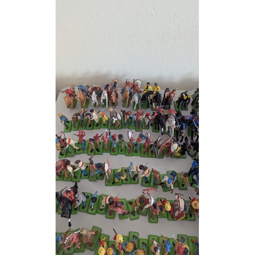 43 - Britains Deetail; A very large collection of unboxed playworn Knights, Turkish, Cowboys and Indian F... 