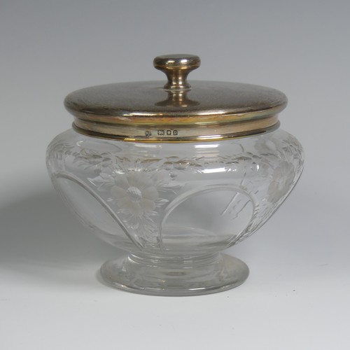 9 - A George V silver mounted glass Dressing Table Jar, by William Comyns & Sons Ltd., hallmarked Lo... 