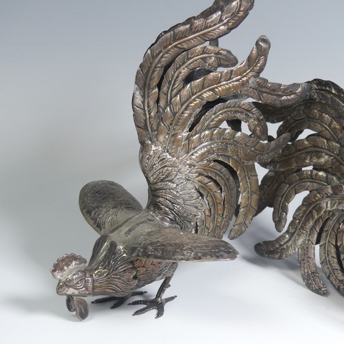 11 - A pair of Peruvian 925 silver Fighting Cocks, naturalistically modelled, the feet marked 'Plata 925 ... 