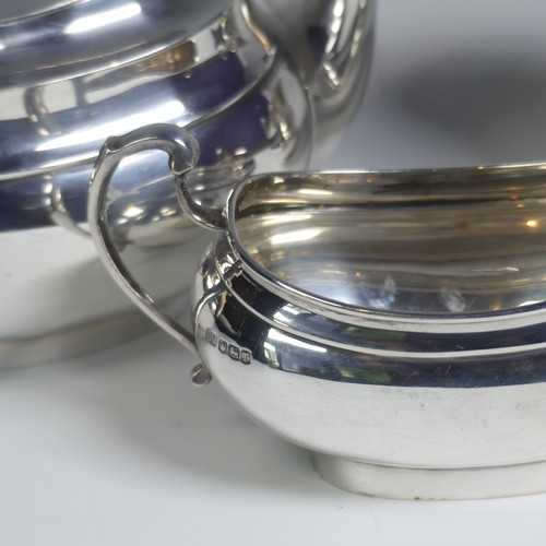 16 - A George V silver three piece Tea Set, by Viner's Ltd., hallmarked Sheffield 1933/4, of plain oval f... 