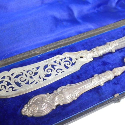 25 - A cased pair of Victorian silver Fish Servers, by Hilliard & Thomason, hallmarked Birmingham 187... 
