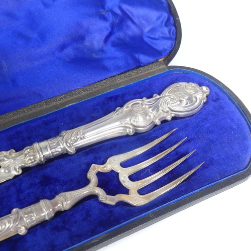 25 - A cased pair of Victorian silver Fish Servers, by Hilliard & Thomason, hallmarked Birmingham 187... 