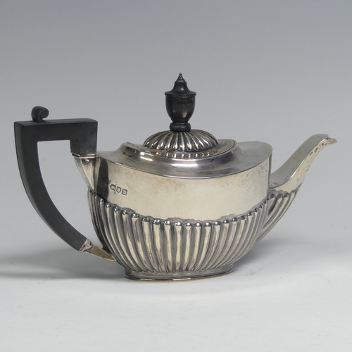 36 - A late Victorian silver bachelor's Teapot, by Thomas Bradbury & Sons, hallmarked London 1897, ov... 