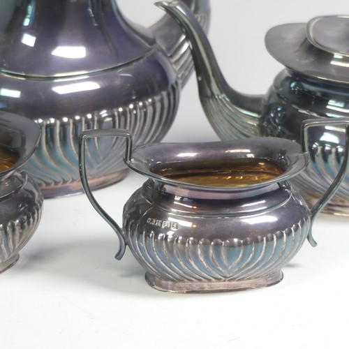 45 - A matched Elizabeth II silver four piece Tea Set, the tea pot, coffee pot and milk jug marked for th... 