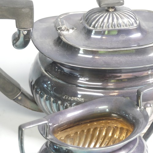 45 - A matched Elizabeth II silver four piece Tea Set, the tea pot, coffee pot and milk jug marked for th... 