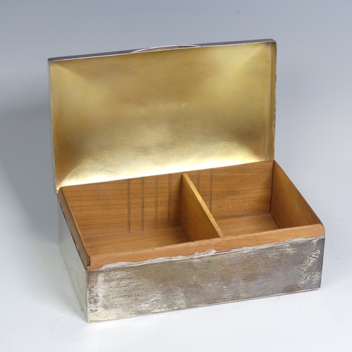 42 - A large Edwardian silver Table Cigarette Box, hallmarked Birmingham 1909, hallmarks rubbed, of plain... 