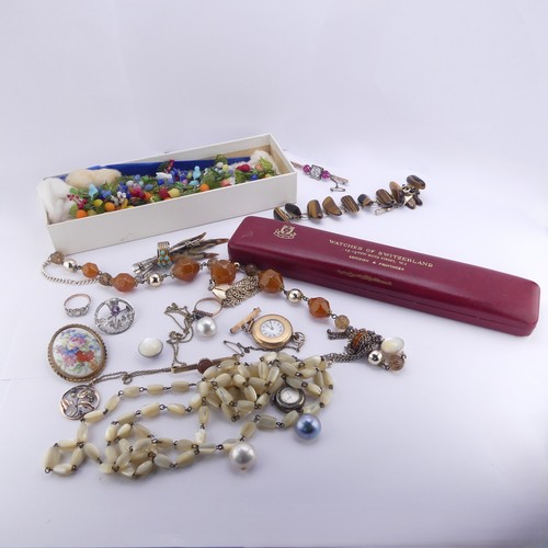 A quantity of Jewellery and Costume Jewellery,  including a Waltham 9ct nurses fob watch, running, case as found, two vintage Murano glass necklaces, one with leaves and fruit, the other birds amongst foliage, an amber coloured facetted bead necklace, a small 9ct gold pierced foliate pendant, a silver thistle brooch, unmounted mabé pearls etc., (a lot)