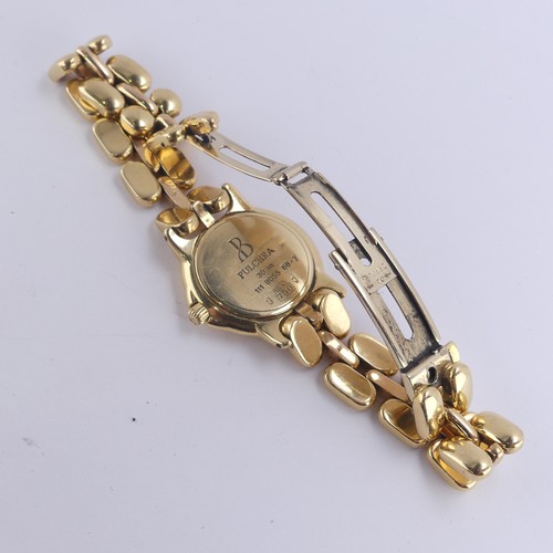 161 - Bertolucci; An 18ct yellow gold and diamond Pulchra lady's quartz Wristwatch, the signed dial with d... 