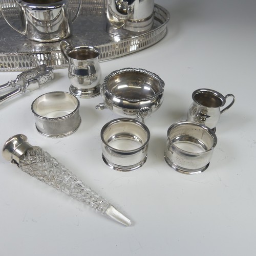 15 - A graduated pair of Elizabeth II miniature silver Mugs, by Bishton's Ltd, hallmarked Sheffield, 1977... 