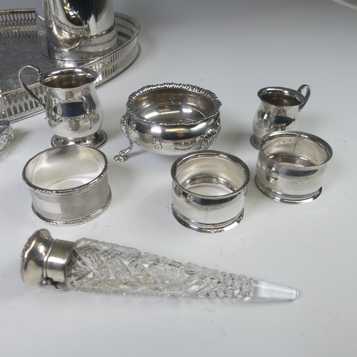 15 - A graduated pair of Elizabeth II miniature silver Mugs, by Bishton's Ltd, hallmarked Sheffield, 1977... 