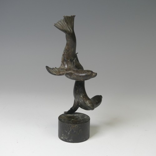 17 - Adam Binder (British, b. 1970), limited edition patinated bronze sculpture of seals, raised on cylin... 