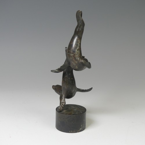 17 - Adam Binder (British, b. 1970), limited edition patinated bronze sculpture of seals, raised on cylin... 