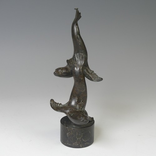 17 - Adam Binder (British, b. 1970), limited edition patinated bronze sculpture of seals, raised on cylin... 