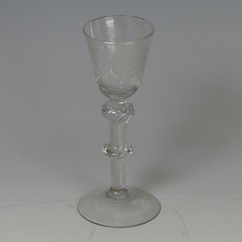 53 - A Georgian air-twist Jacobite Wine Glass, the conical bowl decorated with Jacobite rose, double-knop... 