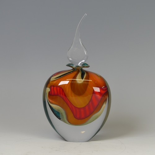 31 - Peter Layton (b. 1937) a studio ovoid glass Bottle, composed of blues, oranges and reds with flared ... 