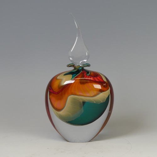 31 - Peter Layton (b. 1937) a studio ovoid glass Bottle, composed of blues, oranges and reds with flared ... 