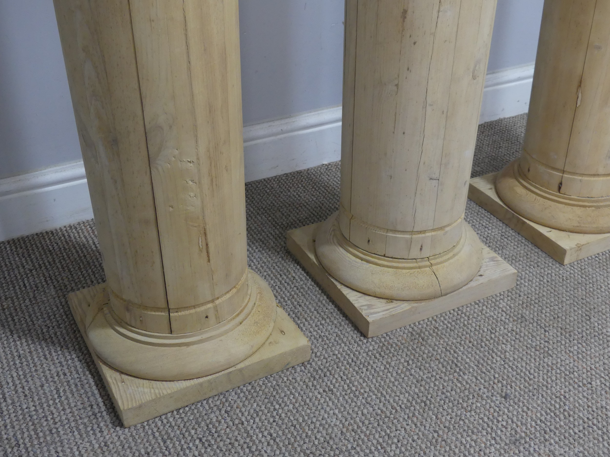 A set of three early 20th century pitch pine Columns, previously used ...