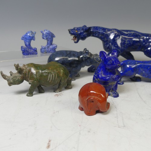26 - A large Lapis Lazuli carved sculpture of a Leopard/Panther, with glass eyes and mother of pearl teet... 