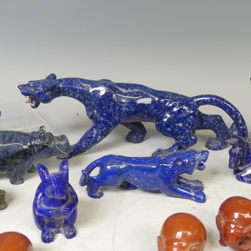 26 - A large Lapis Lazuli carved sculpture of a Leopard/Panther, with glass eyes and mother of pearl teet... 