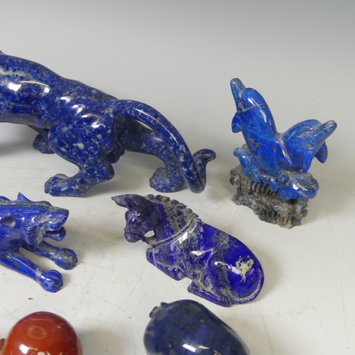 26 - A large Lapis Lazuli carved sculpture of a Leopard/Panther, with glass eyes and mother of pearl teet... 