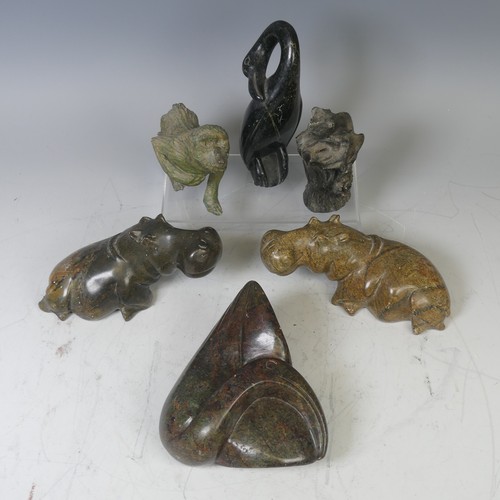 23 - An African stone carving of a Hippopotamus, possibly from Zimbabwe, unsigned, L 17 cm, together with... 
