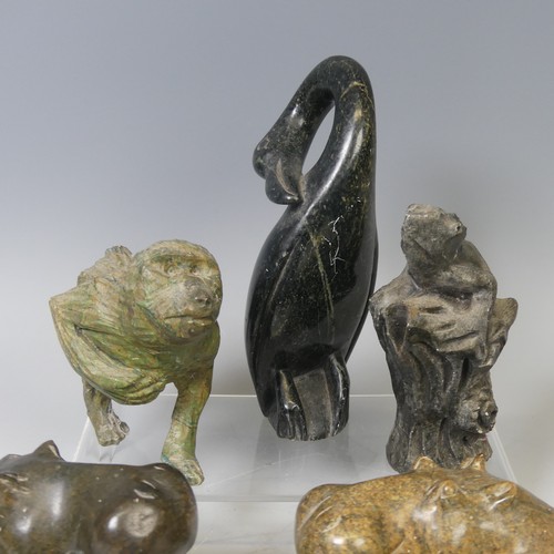 23 - An African stone carving of a Hippopotamus, possibly from Zimbabwe, unsigned, L 17 cm, together with... 