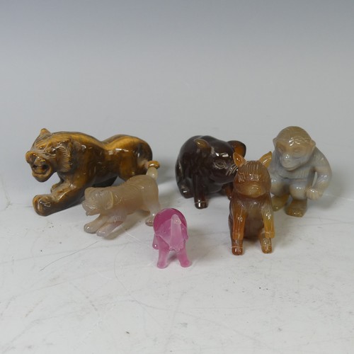 24 - A grey banded agate carving of a Chimp, possibly Chinese, H 5 cm, together with four other carved ha... 