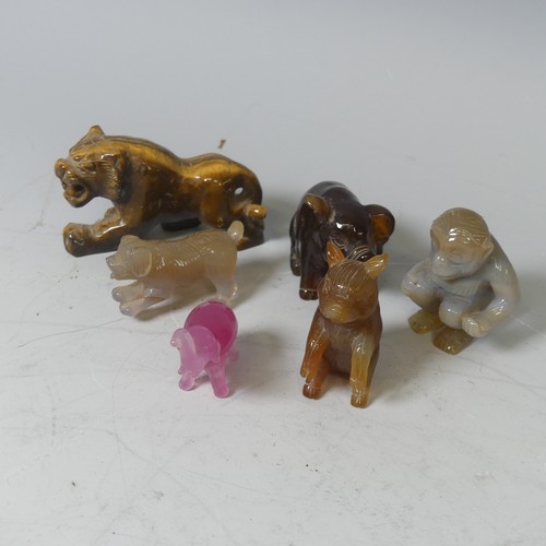 24 - A grey banded agate carving of a Chimp, possibly Chinese, H 5 cm, together with four other carved ha... 